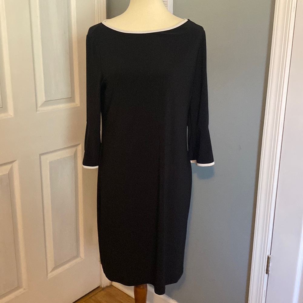 Nik & Nash Black dress with white trim and bell sleeves.
